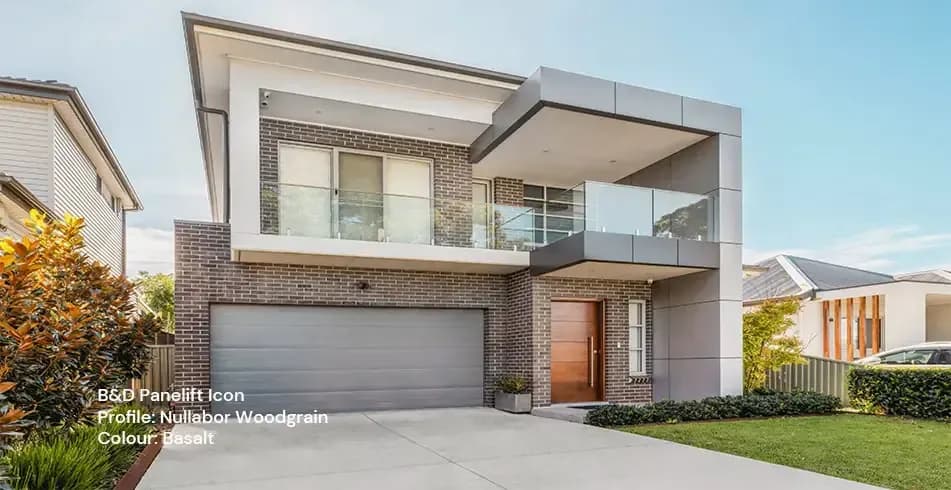 B&D Panelift Icon sectional garage door on a modern home — manufacturer image