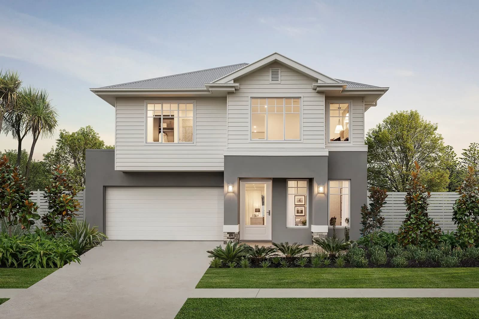Steel-Line Slimline sectional garage door in Dover White on a Hamptons-style home — manufacturer image
