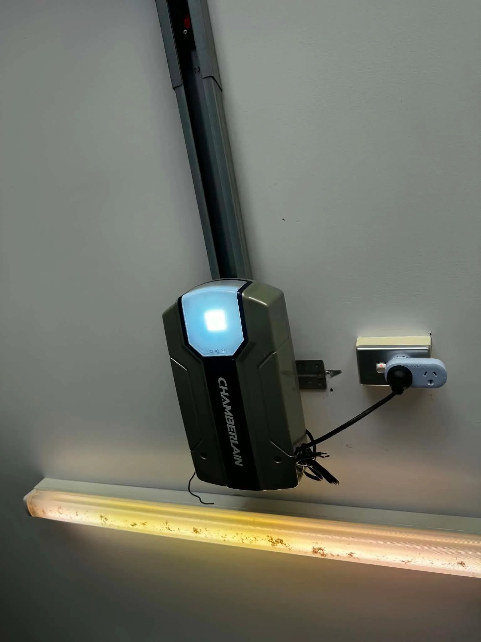 New Chamberlain garage door opener installed on the ceiling rail above a sectional door in Butler, Perth New Chamberlain garage door opener installed on the ceiling rail above a sectional door in Butler, Perth