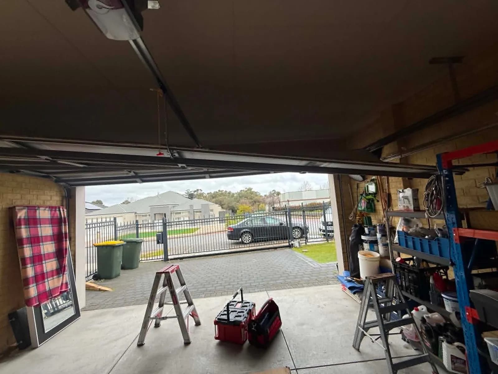 Sectional garage door back in its tracks with the opener reconnected in Secret Harbour, Perth Sectional garage door back in its tracks with the opener reconnected in Secret Harbour, Perth