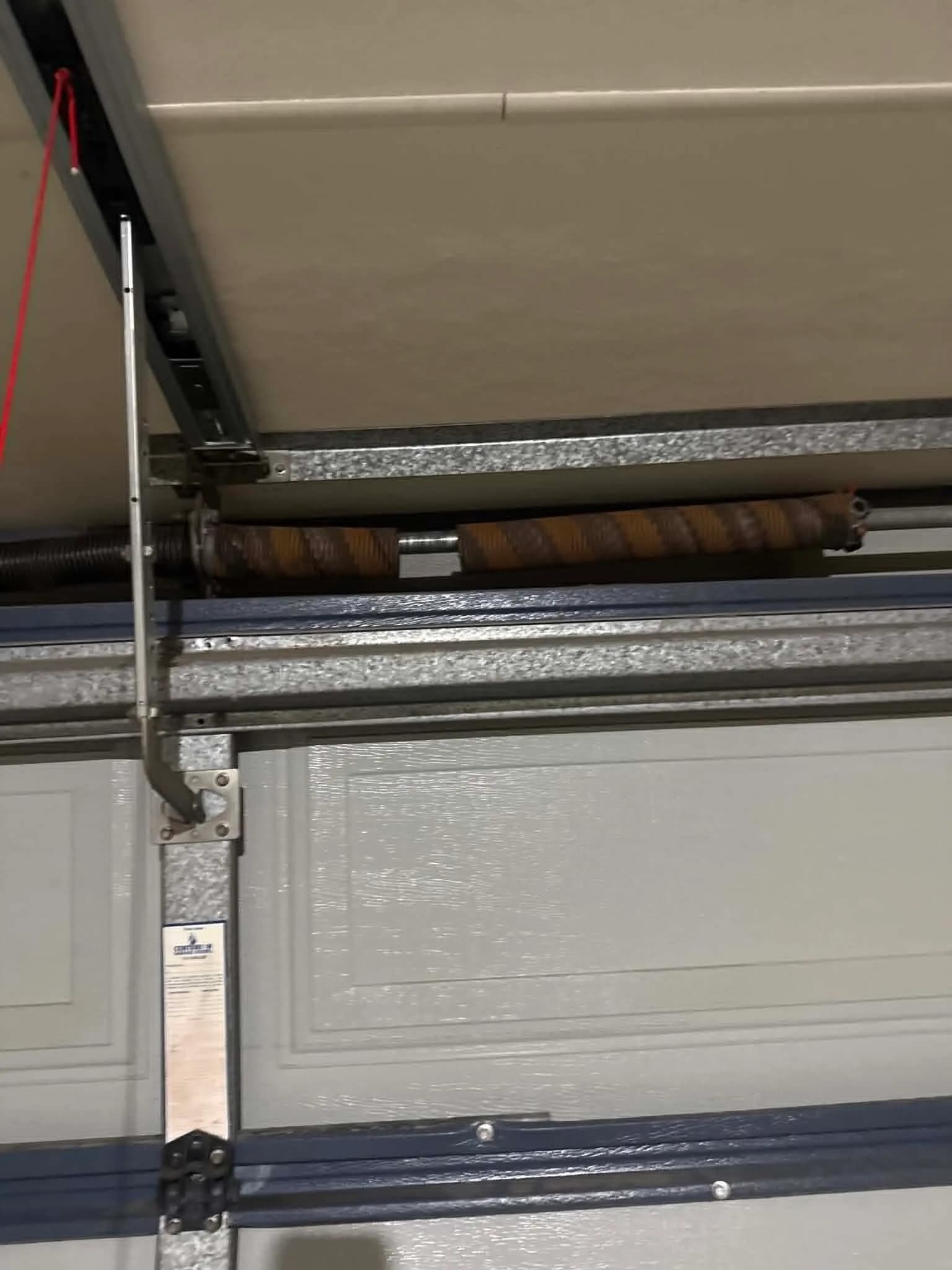 Heavily rusted garage door torsion spring in Kalamunda before replacement Heavily rusted garage door torsion spring in Kalamunda before replacement